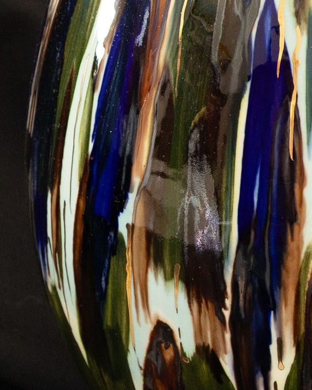Detail of - Porcelain object by Pia Andersen, inspired by water, light and reflections, with layered underglazes, oxides and details in 14-carat gold.