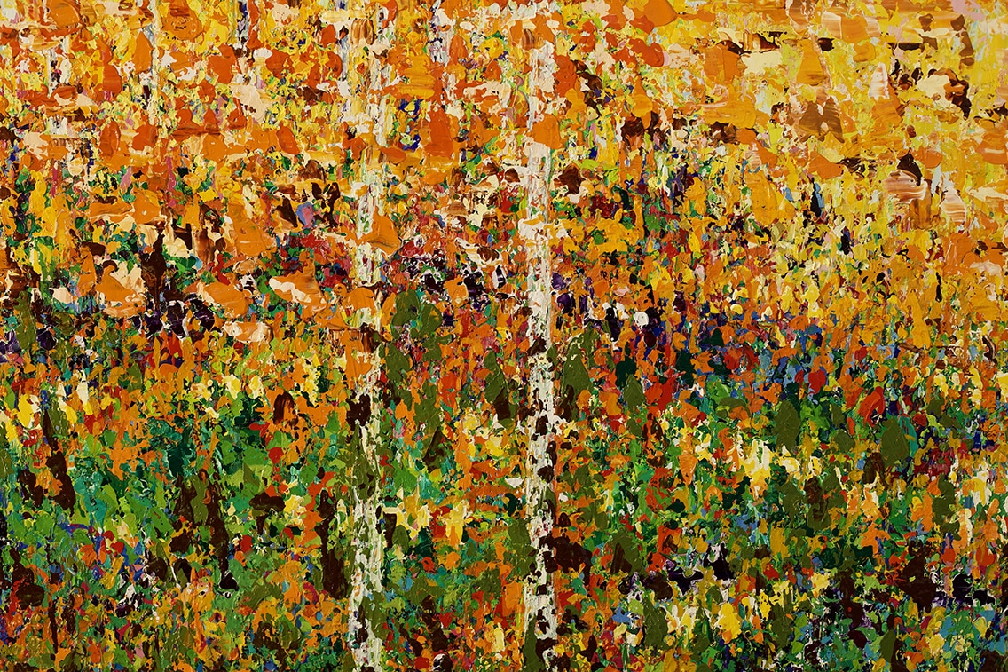 A detail from October by Pia Andersen, where luminous yellows and vibrant oranges merge in warm, shifting hues, capturing the light and glowing colours of an autumn forest.