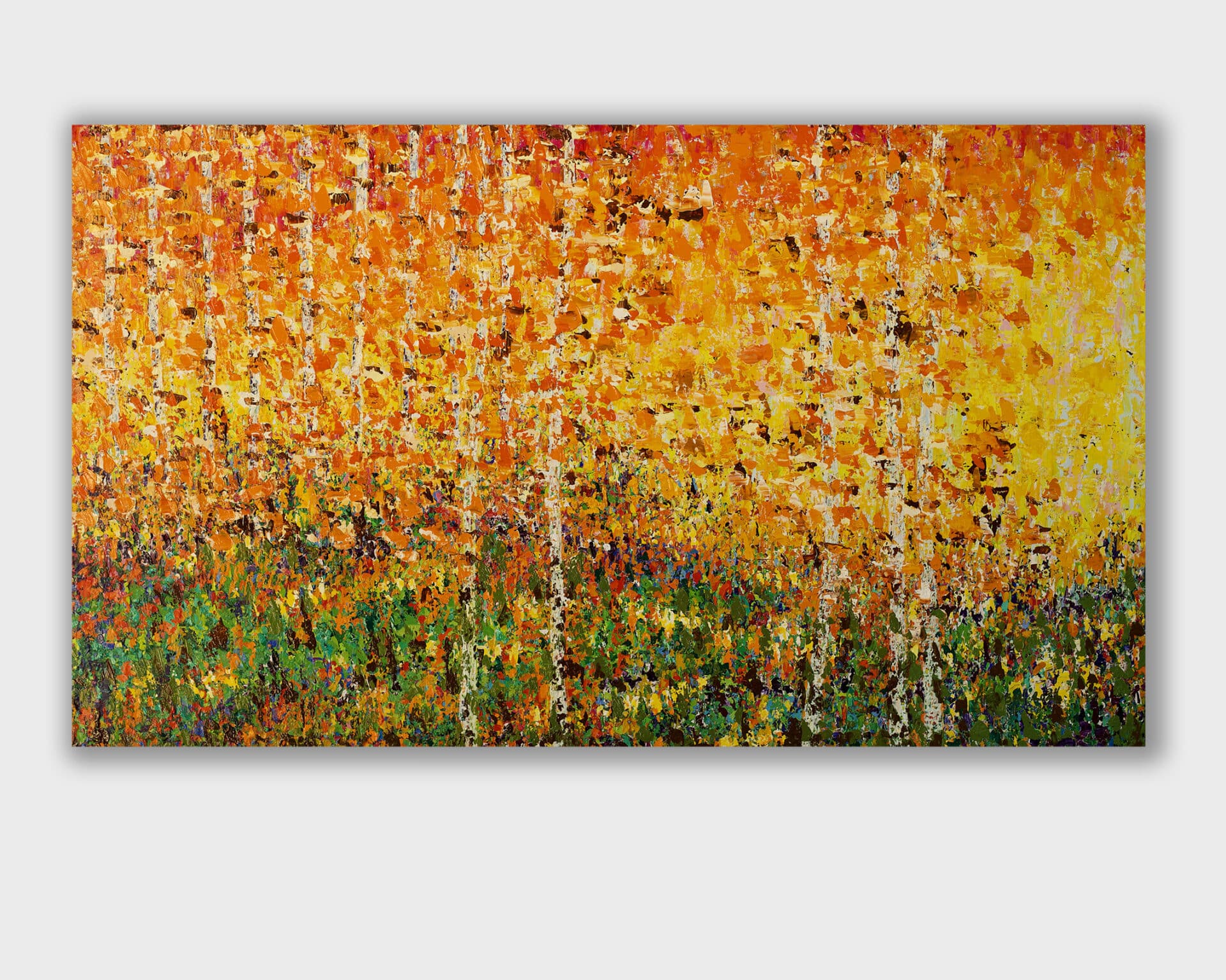 large abstract oil painting in warm yellow, orange and ochre, inspired by falling leaves, hidden tree trunks and the luminous atmosphere of an autumn forest by Pia Andersen. Here on a white wall